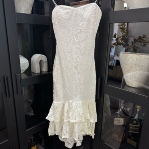 Elegant White Lace Dress with Ruffles